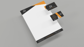 wizytowki i papier firmowy na szarym tle